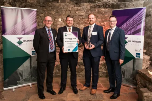Photograph of four members of the Winchburgh design team accepting the Geotechnical award for the new M9 junction at the Scottish Civil Engineering Awards awards dinner.