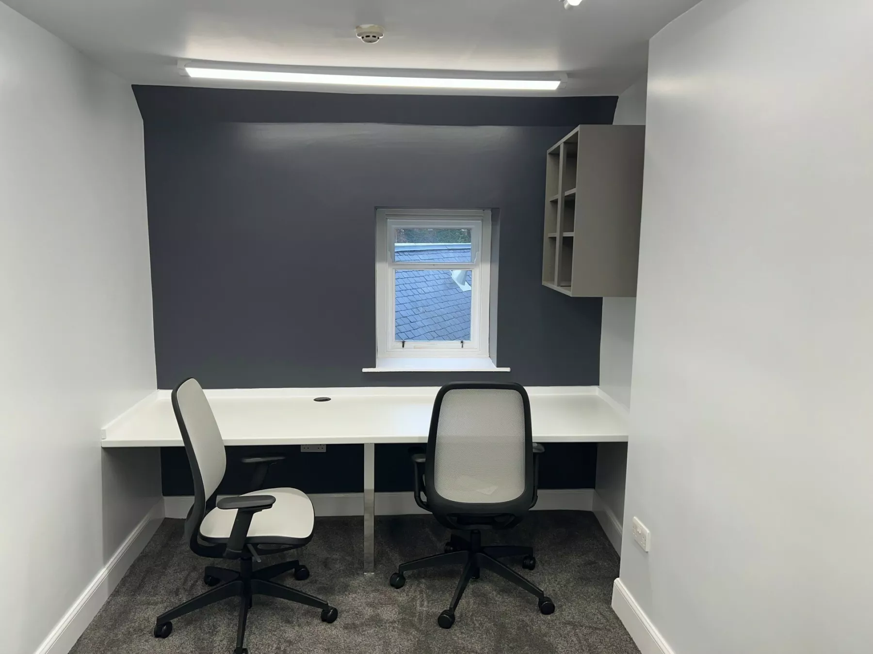 Internal photograph of desk area with 2 chairs in the Thomson Gray newly refurbished Melrose office